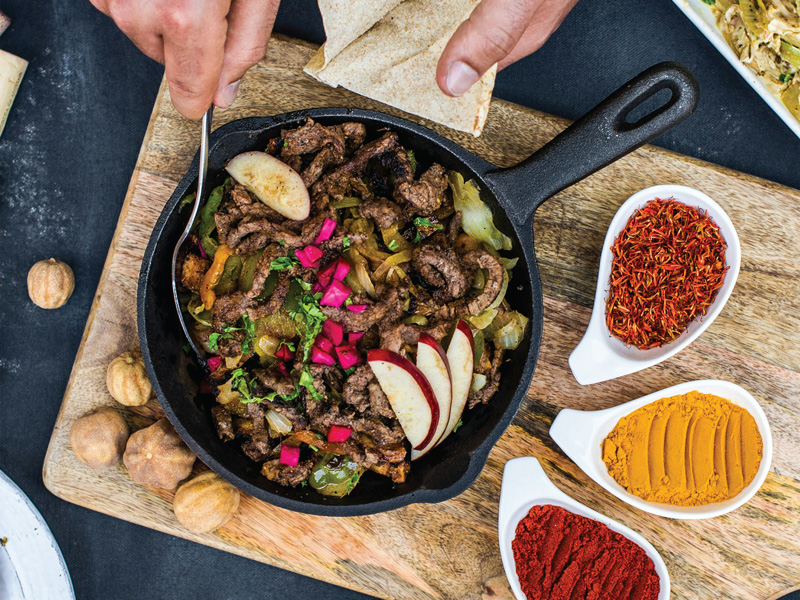 Selection of grilled meat and Middle Eastern dishes